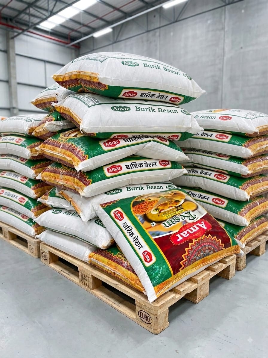 Amar Barik Besan sacks stacked on wooden pallets